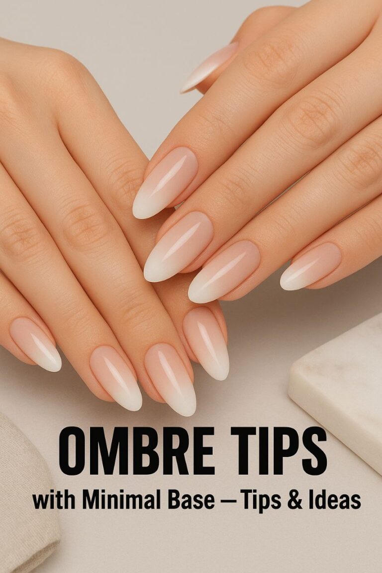 Hands with nude or light pink minimal base nails featuring soft white ombre tips, styled in a clean and elegant studio setting with soft lighting.
